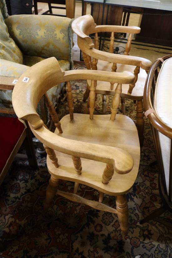 Pair light oak captains chairs